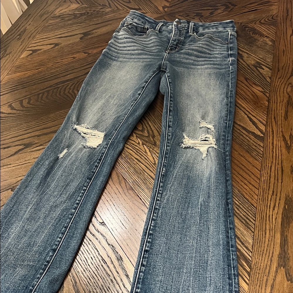 Distressed Blue Jeans